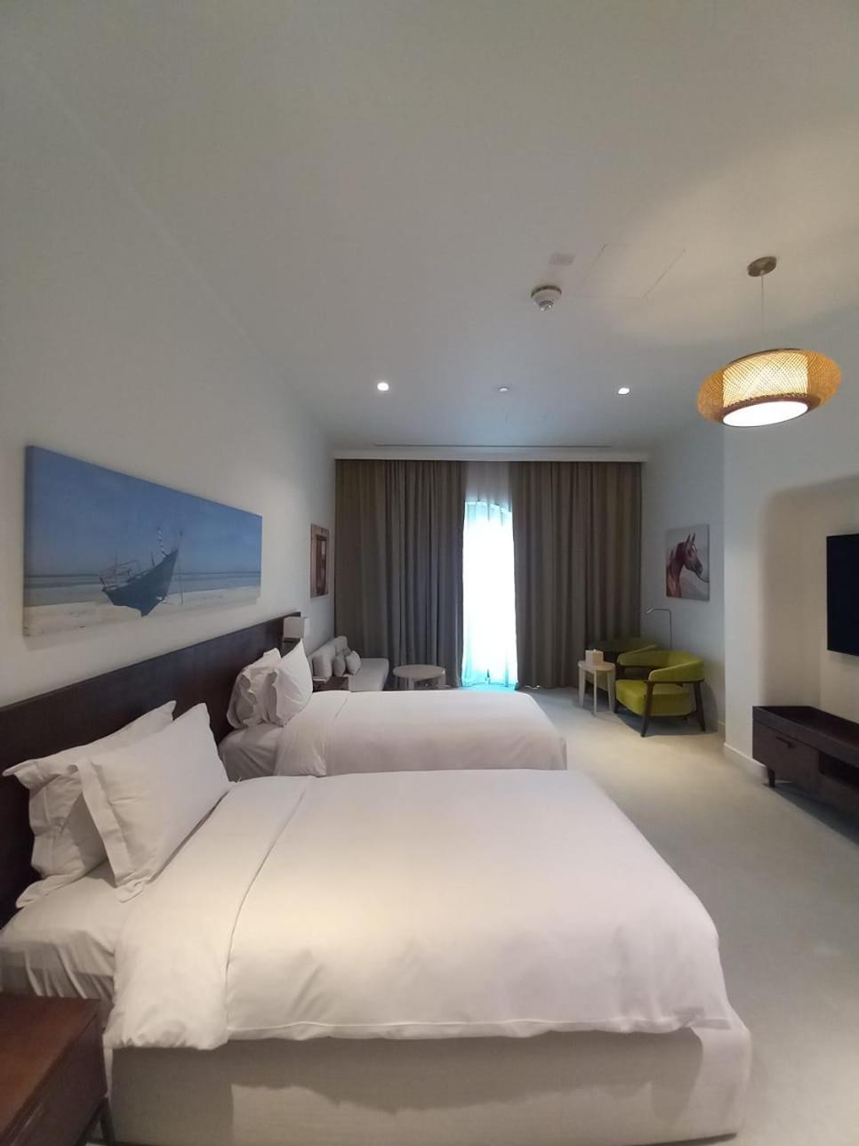 דוחה Mina Hotel And Residences By The Torch מראה חיצוני תמונה A room at the hotel